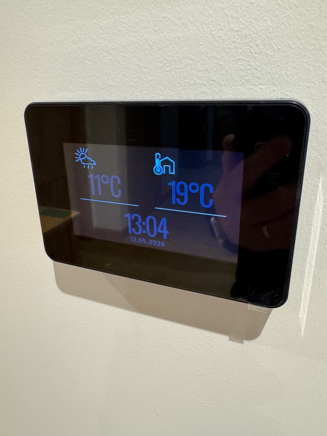 Smart heating control panel showing room temperatures